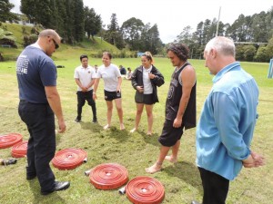 Matua Bevan inspecting the hoses.