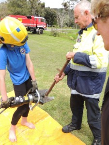 Jazmine operating the Jaws of Life.